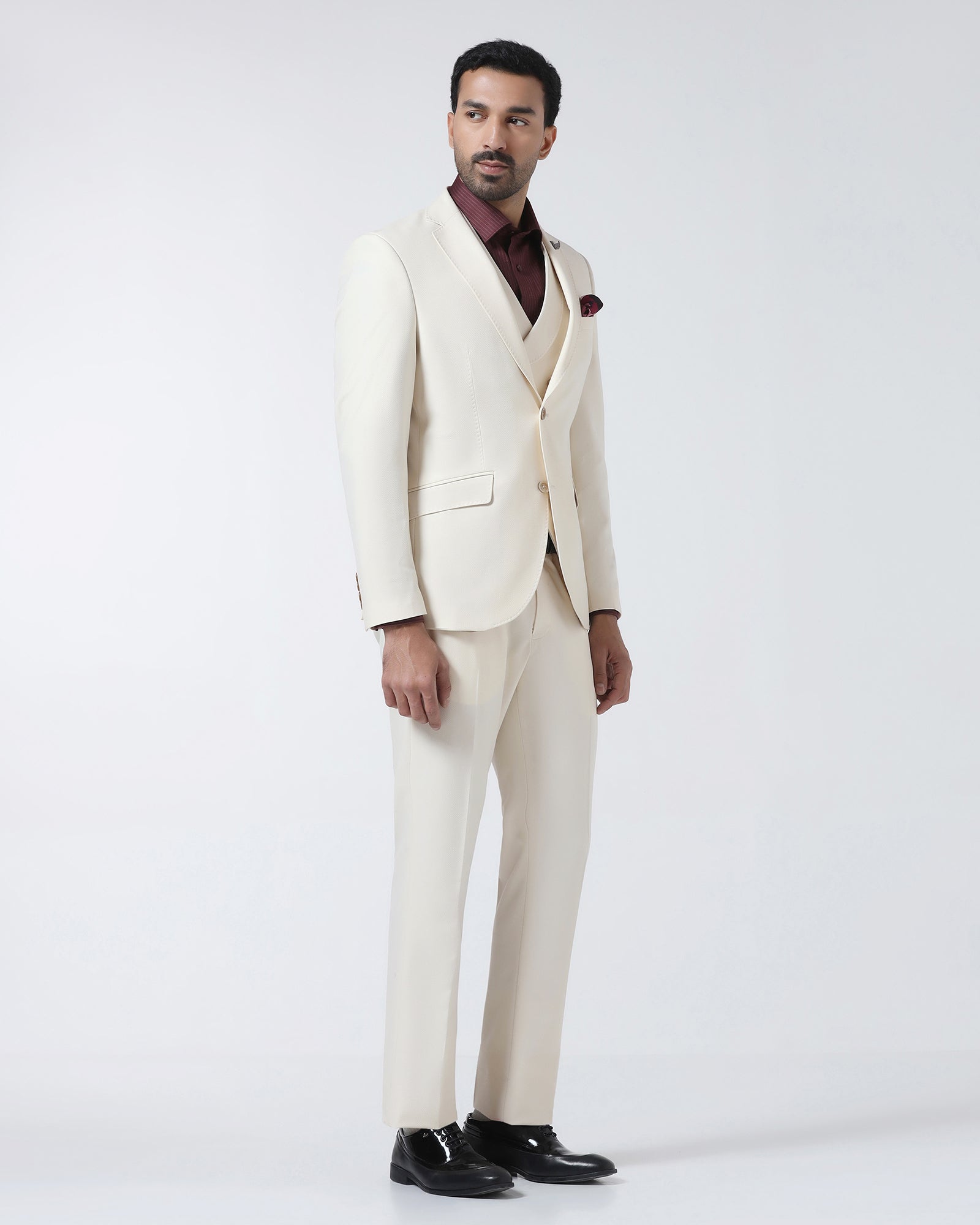 Off White Three Piece Textured Suit - Jiddle