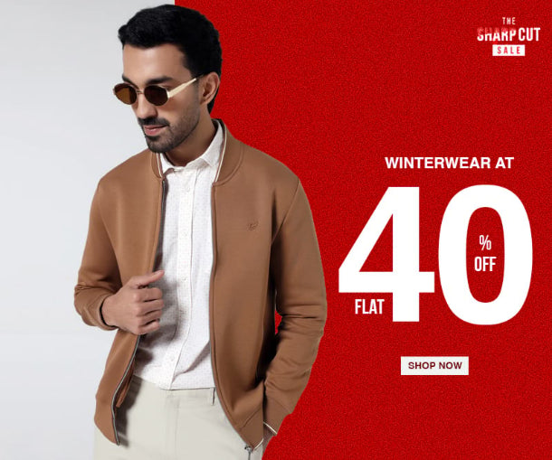 Man wearing a brown jacket with a promotional banner for winterwear sale on a red background