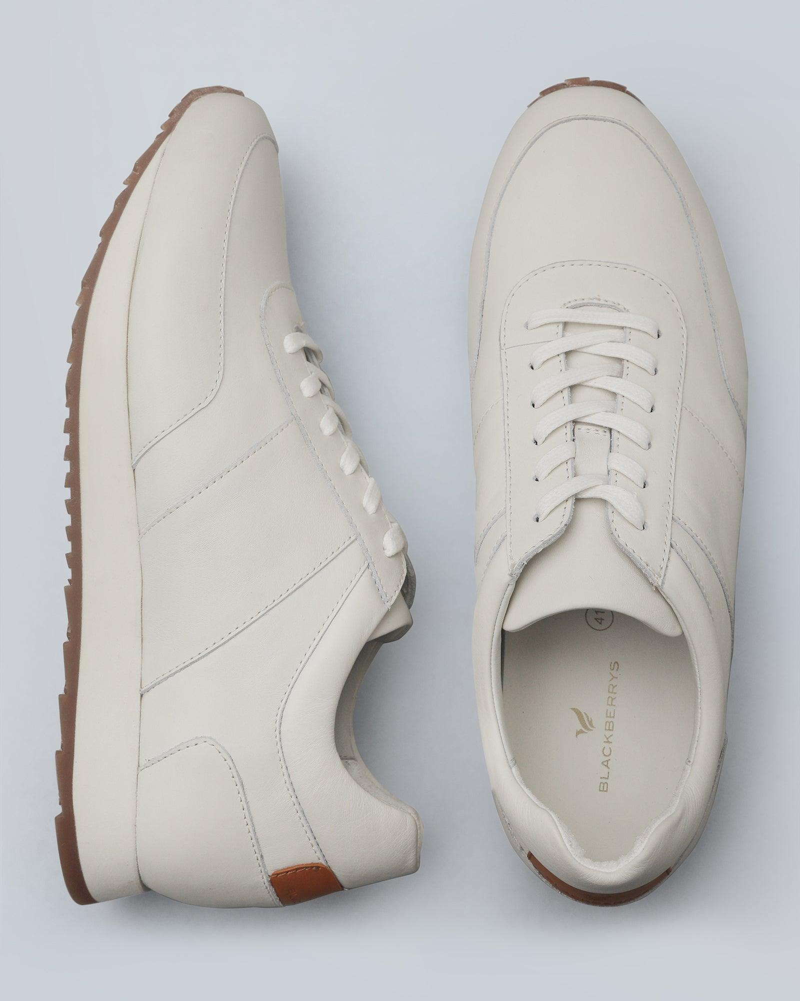 Leather Off White Solid Sneakers - Osmando